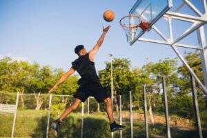 C60 To improve Your Sports Skills - man playing basketball