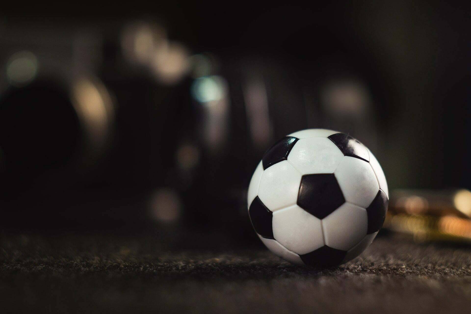 soccer ball sitting on the ground representing C60 supplements